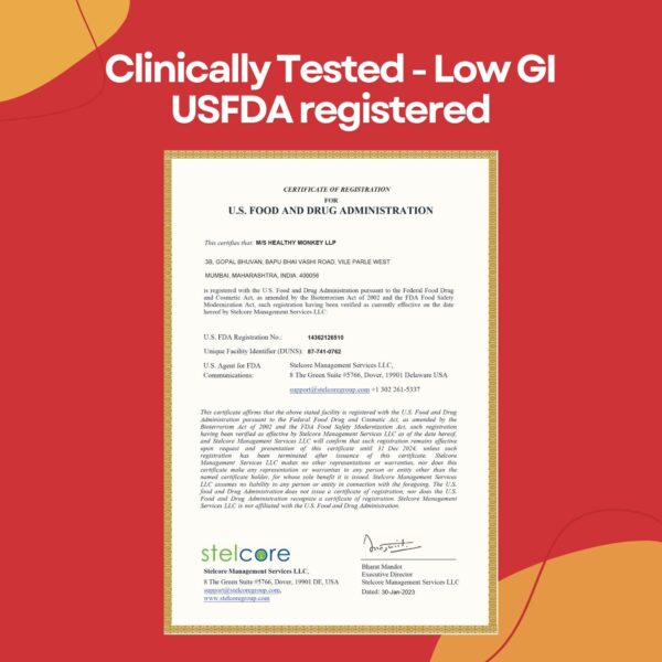 USFDA registration certificate for Healthy Monkey LLP, Mumbai, displayed on a red background with the headline 'Clinically Tested - Low GI, USFDA registered' and contact details of Stelcore Management Services LLC.